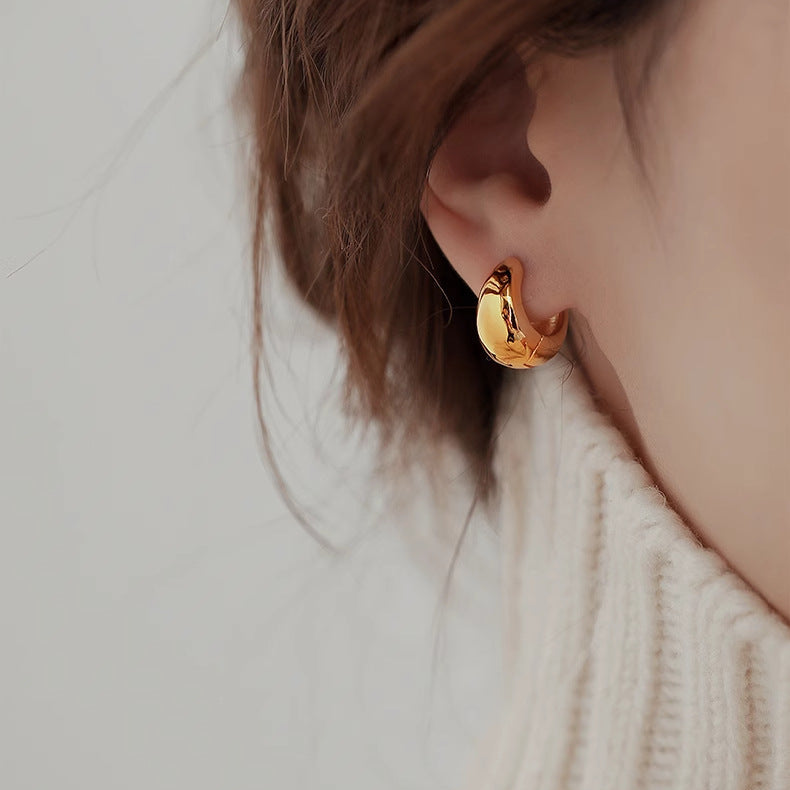Modern Curved Gold Earrings — Contemporary Classic