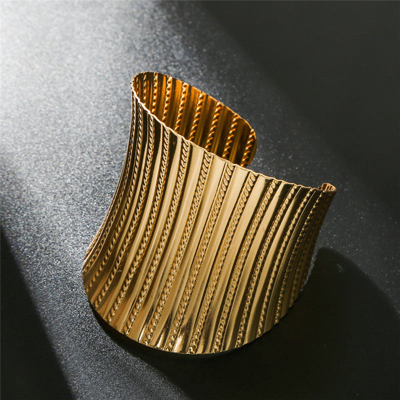 Exaggerated Gold Bracelet — Statement Style