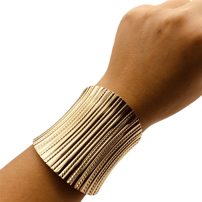 Exaggerated Gold Bracelet — Statement Style